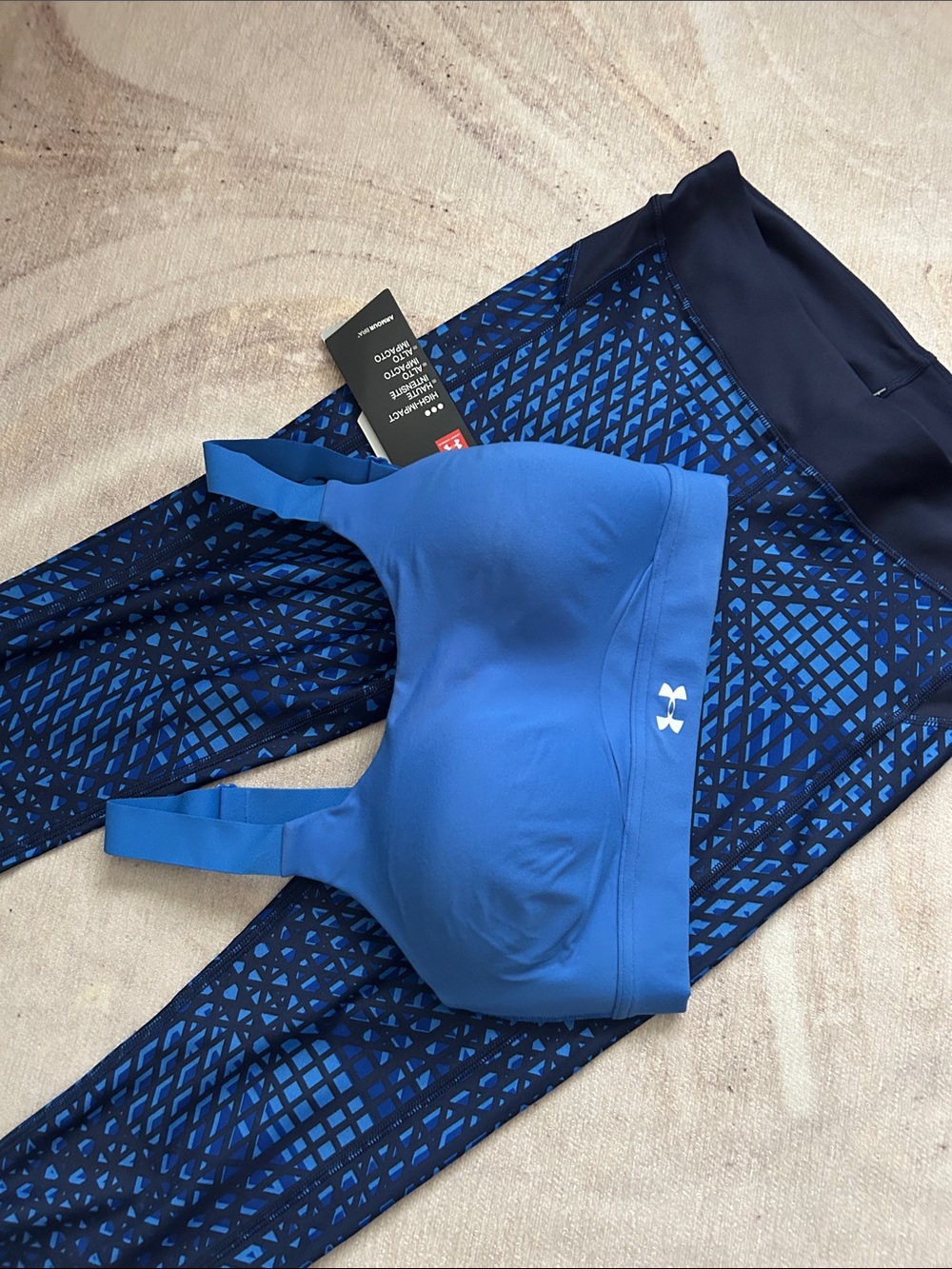 Under Armour High Impact Blue Sports Bra with Navy Patterned Heat Gear Leggings
